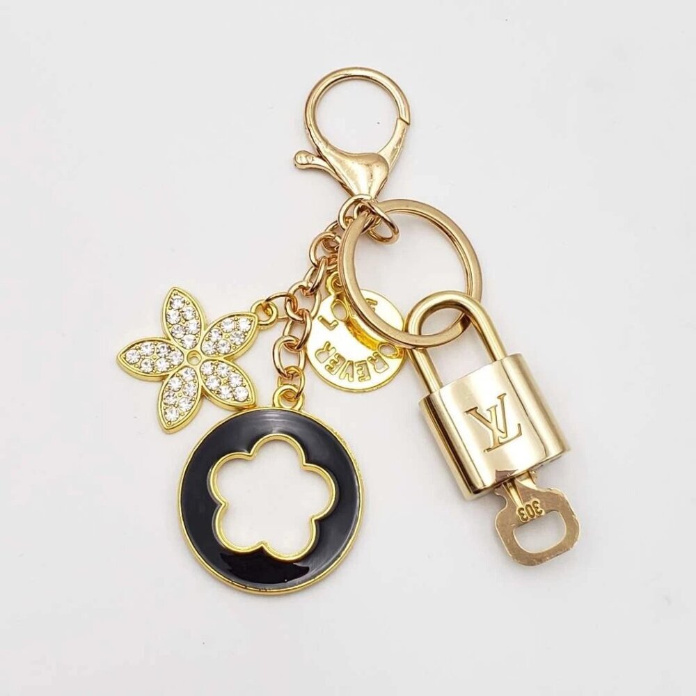 Authentic Louis Vuitton Lock & Key with unbranded Flower Bagcharm, Keycharm